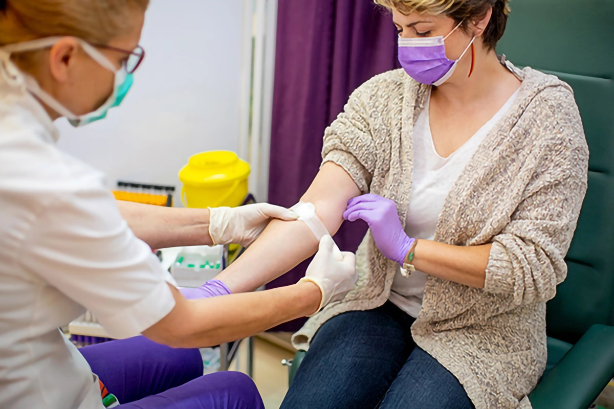 Image of a person having a blood test